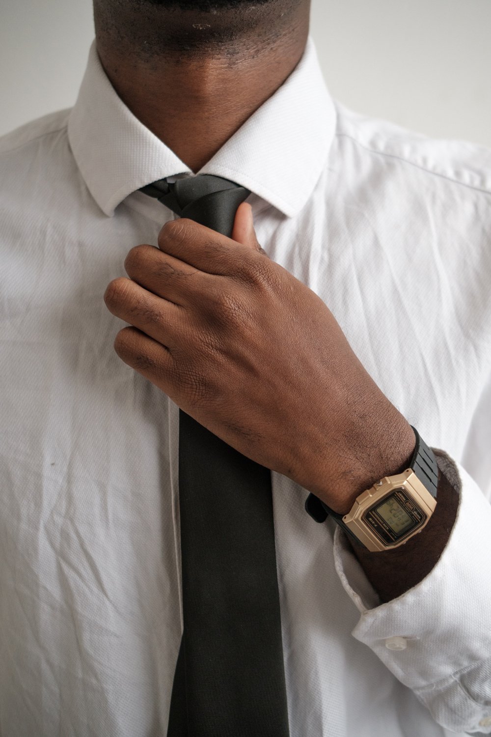 Man in White Dress Shirt and Black Tie